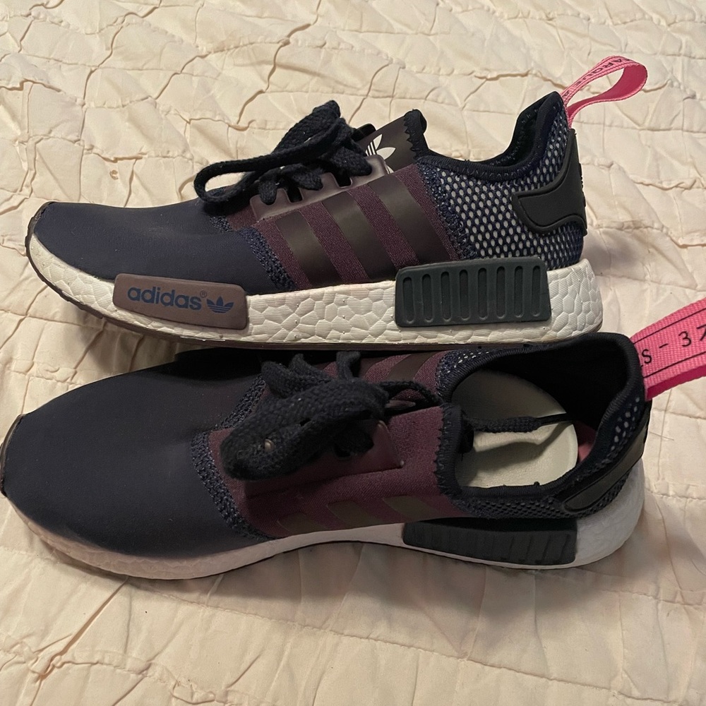 Like new Adidas shoes size 6. Color is navy blue and purple.